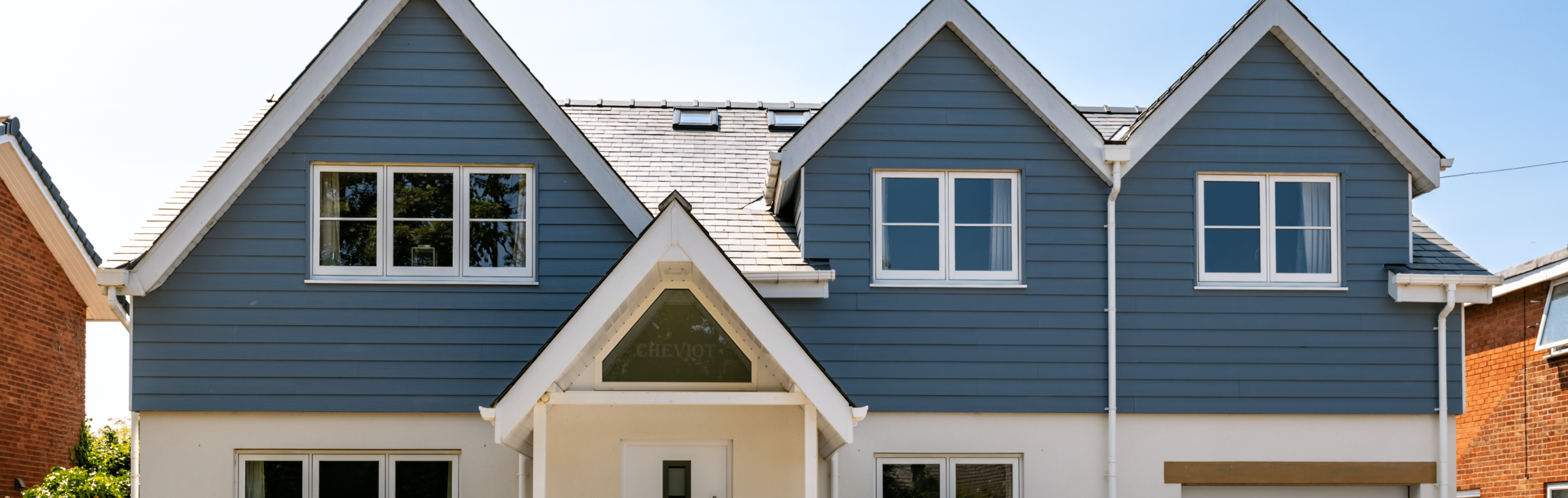 house with cladding and pvc windows