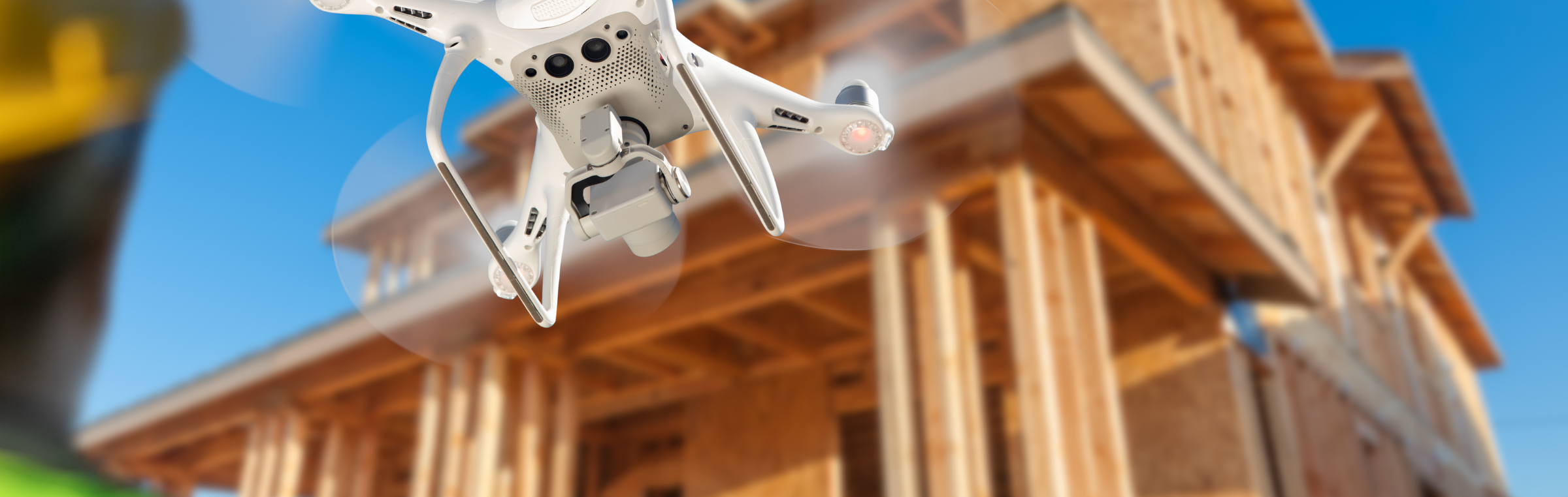 Drone flying around a building site